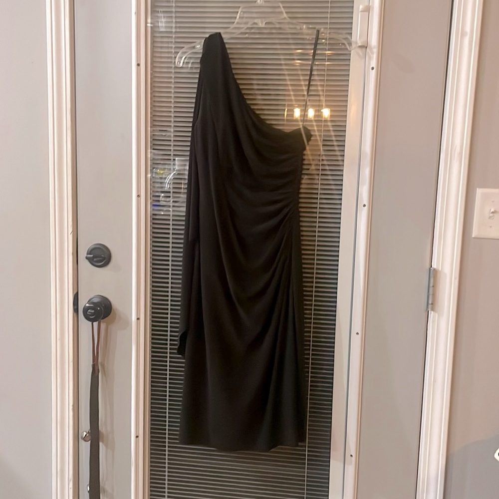 One shoulder Ralph Lauren black dress. It is very flattering. Size 8